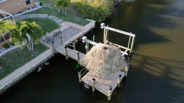 Dock with Boat Lift and Tiki