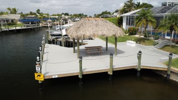 Dock with Boat Lift and Tiki Hut