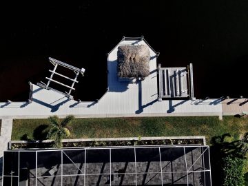 New Construction Dock with a Boat Lift, Tiki Hut, and Jet ski Lift