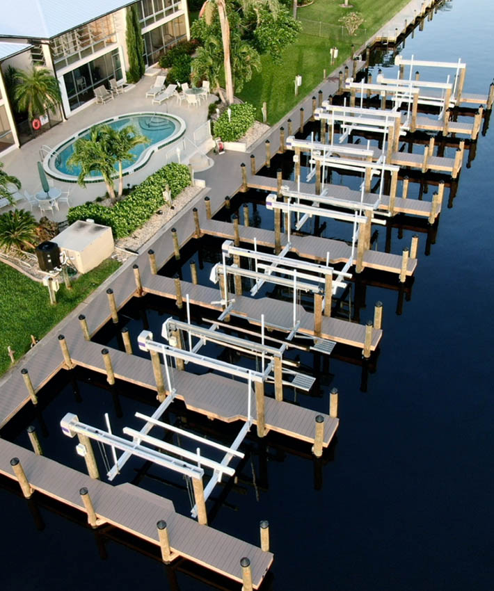Multiple docks installed behind multifamily property in southwest florida