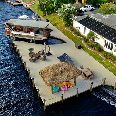 Dock aerial including boat lift and tiki hut