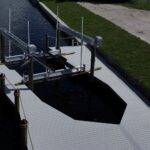 27,000 lb IMM Platinum boat lift installed inside a new Cape Coral dock