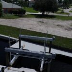 Boat lift cradle and WearDeck decking on a new northwest Cape Coral dock