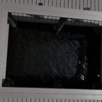 Overhead view of the 8 by 12 foot open water observation cutout in a Cape Coral dock