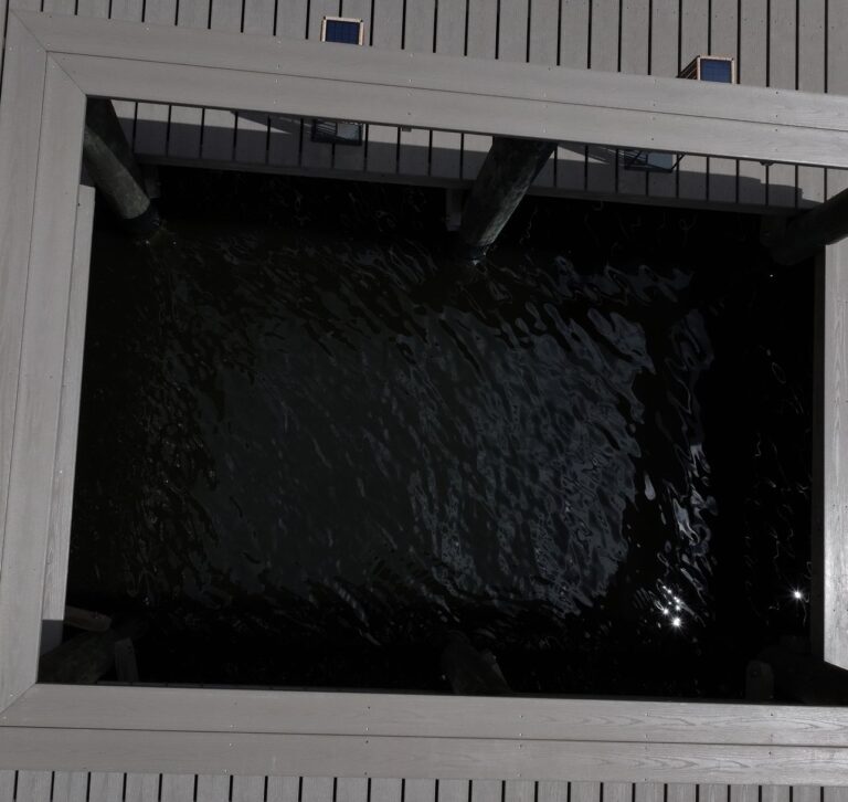 Overhead view of the 8 by 12 foot open water observation cutout in a Cape Coral dock