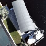 Aerial view of a high speed IMM lift and canopy on a Cape Coral canal