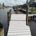 Gray and light gray two-tone WearDeck dock addition in Cape Coral