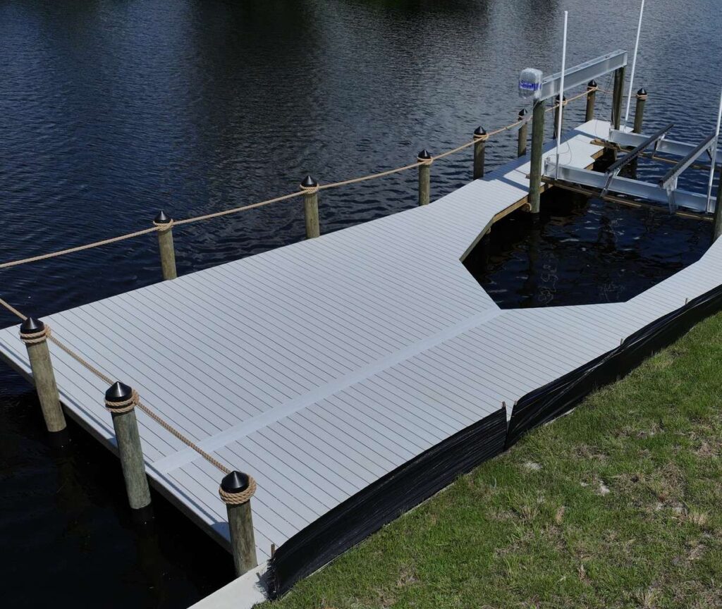 Bow-shaped boat slip and lift inside a new WearDeck dock in northwest Cape Coral