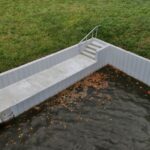 Finished concrete deck along the new seawall at the Overbrook site in Englewood