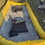 Storm drain inlet protection set up before seawall work in Englewood
