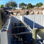 Truline vinyl seawall forms set in place along the canal in Englewood