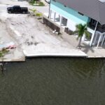 Aerial view of a canal lot on Fort Myers Beach after a 40 foot seawall replacement