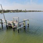 Hurricane damaged pier at Menard-May Park in Edgewater before replacement