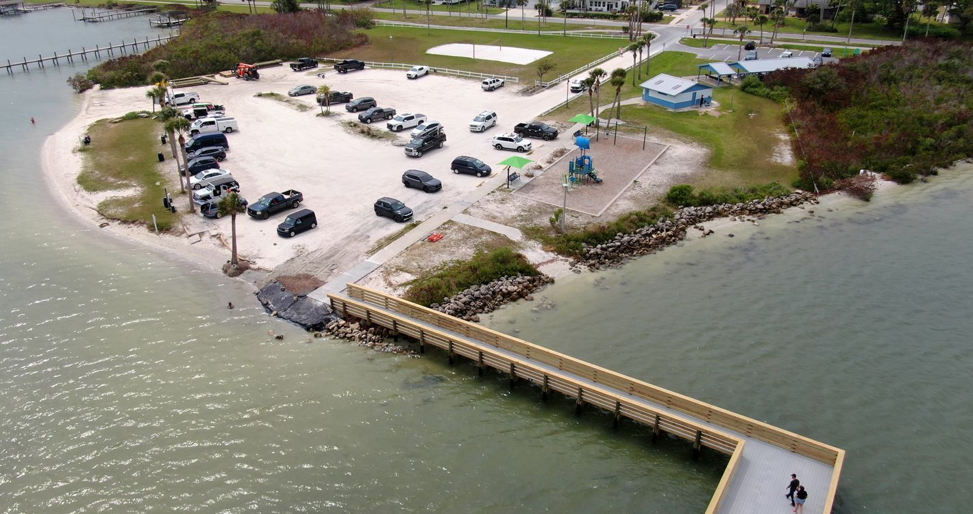 Aerial view of Menard-May Park and its new L-shaped fishing pier in Edgewater, FL
