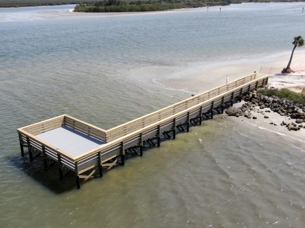 Finished Menard-May Park pier platform with grated decking and railings