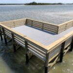 ThruFlow grated decking and timber railings on the Menard-May Park pier platform