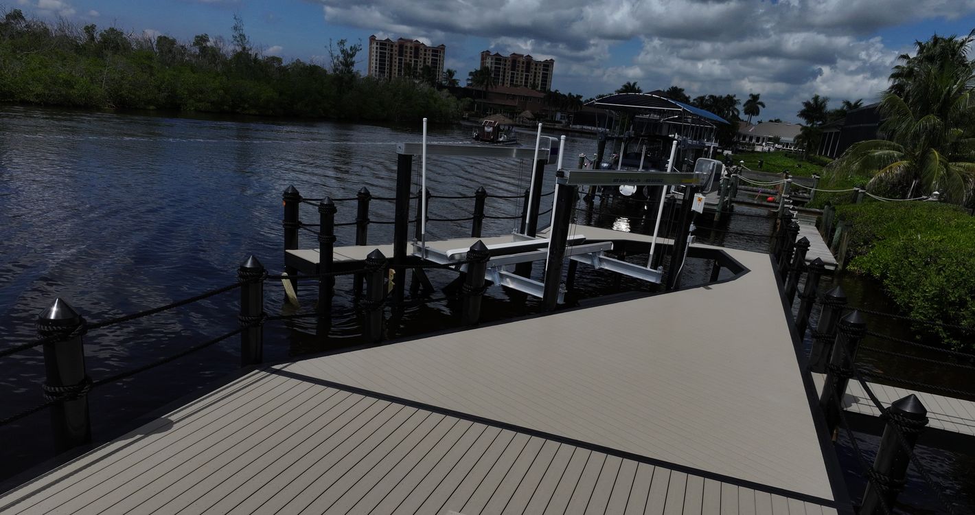 New WearDeck dock with black rope rail at a Tarpon Estates home in Cape Coral