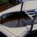 13,000 lb IMM Platinum boat lift beside the new dock in Tarpon Estates, Cape Coral