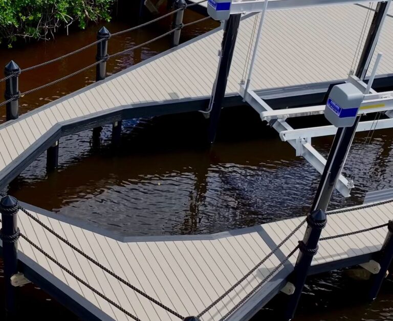 13,000 lb IMM Platinum boat lift beside the new dock in Tarpon Estates, Cape Coral