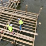 WB Williamson Bros. crew installing joists on the new Edgewater public pier