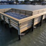 End platform with full timber railings on the new Veterans Memorial Park pier in Edgewater