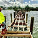 New timber framing and pilings during the Veterans Memorial Park pier replacement in Edgewater